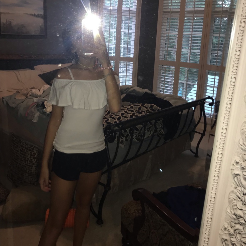 White off the should shirt